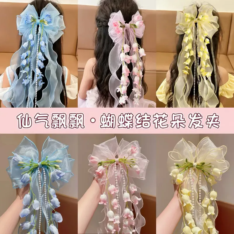 Kẹp Tóc Nơ Voan Tơ Đính Hoa Linh Lan Rủ Dài Phối Ngọc Trai Phong Cách Tiên Tử